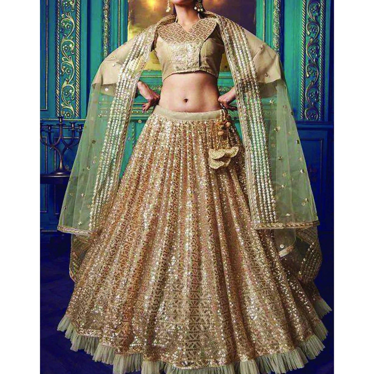 Cream Colored Party Wear Lehenga Choli with Heavy Sequence Work