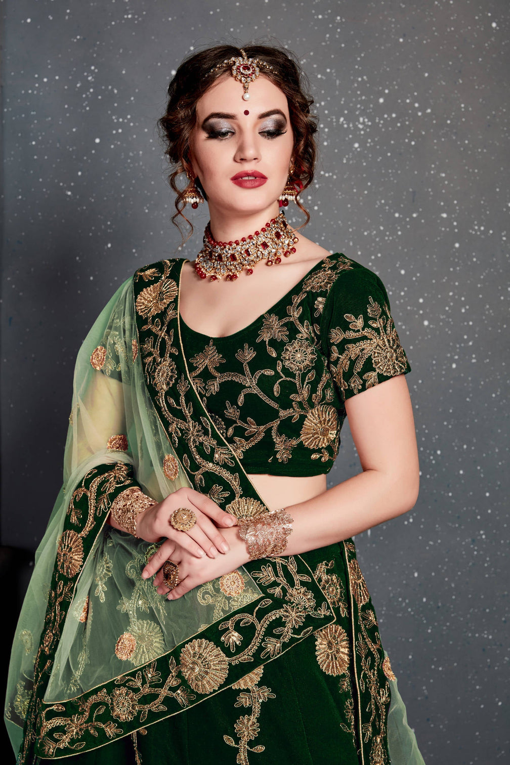 Demanding Dark Green Bridal Wear Embroidered Velvet Lehenga Choli