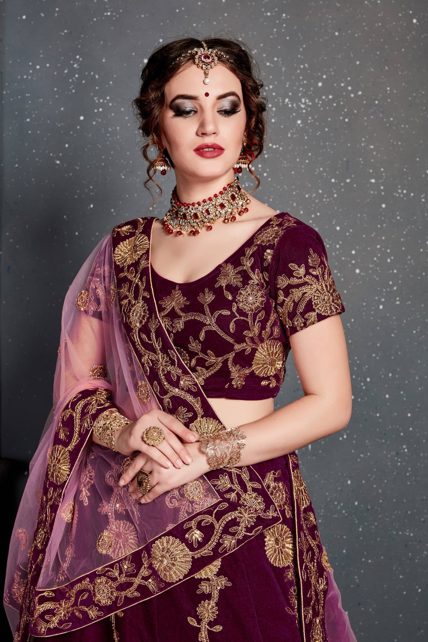 Energetic Purple Bridal Wear Embroidered Velvet Lehenga Choli