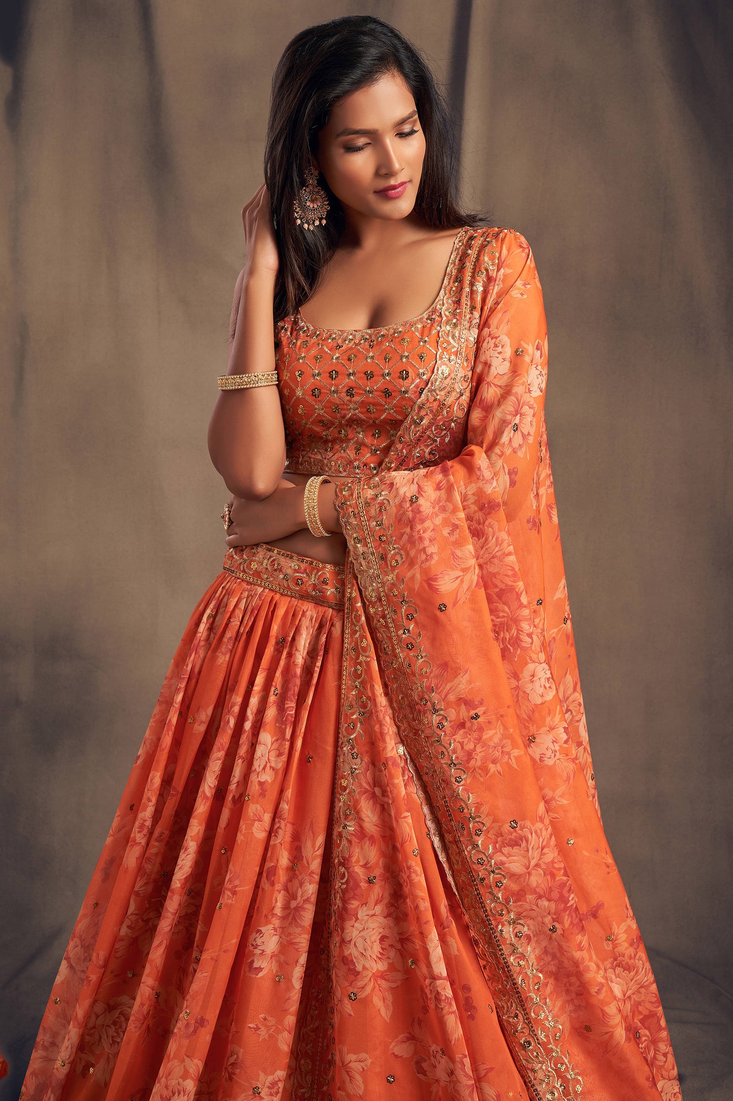 Pretty Orange Zari Embroidery Organza Occasional Wear Lehenga Choli