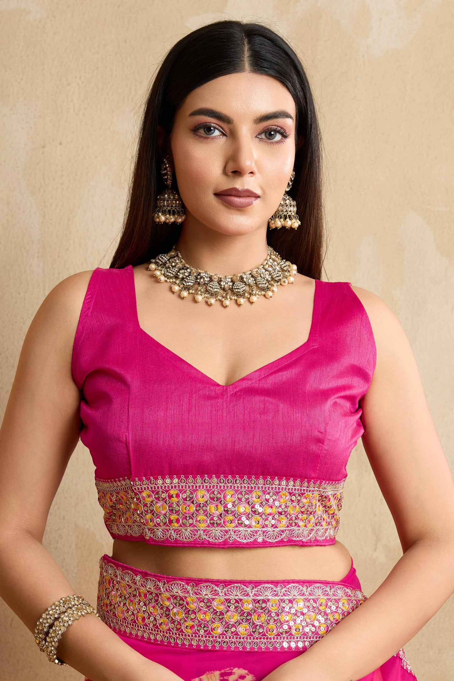 Pink Georgette Saree with Contemporary Tie-Dye Patterns and Classic Lace Work Finish