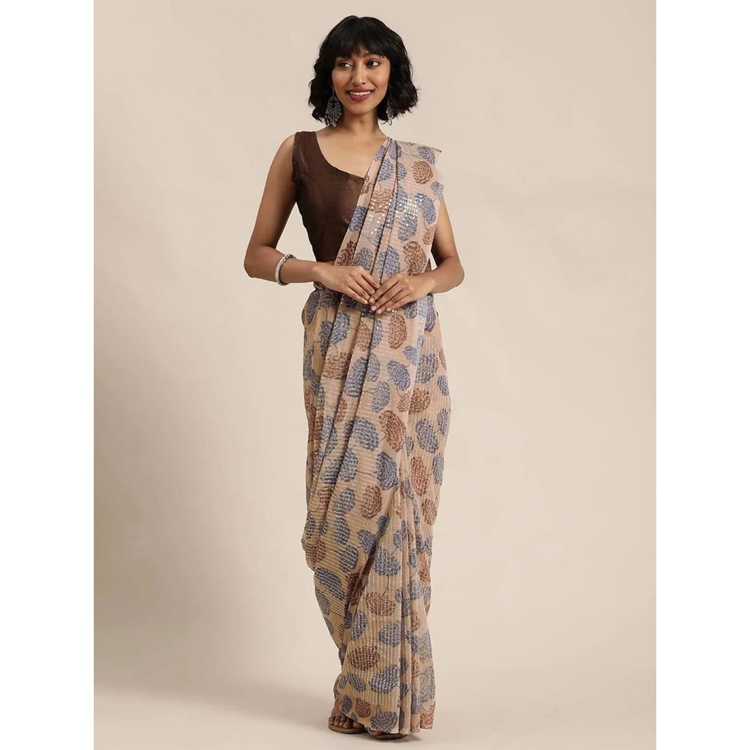 Full sequence Beige Saree with Coffee Blouse
