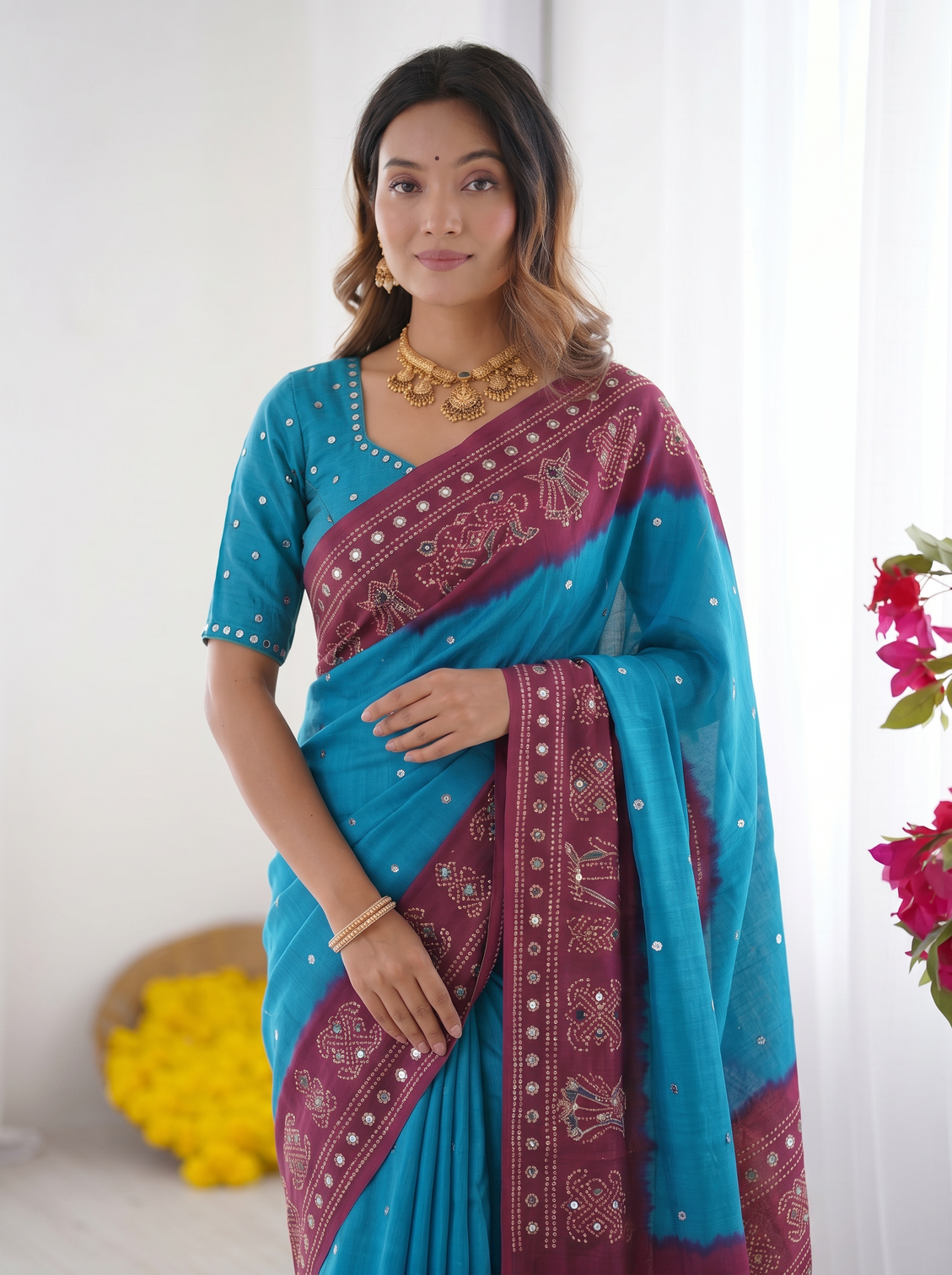Sky blue wine purple bandhani printed cotton silk saree with traditional folk border tassel pallu