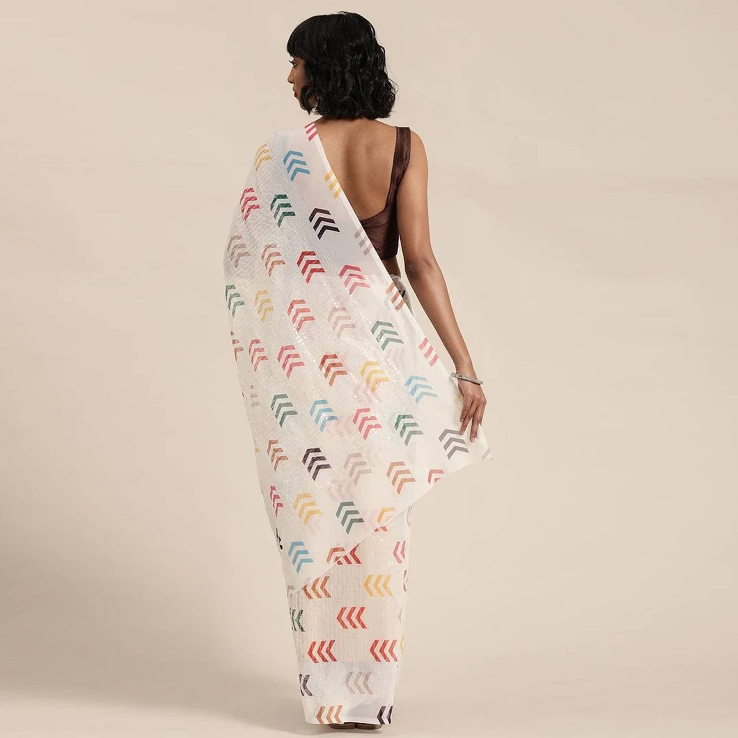 Full sequence White Saree with Coffee Blouse