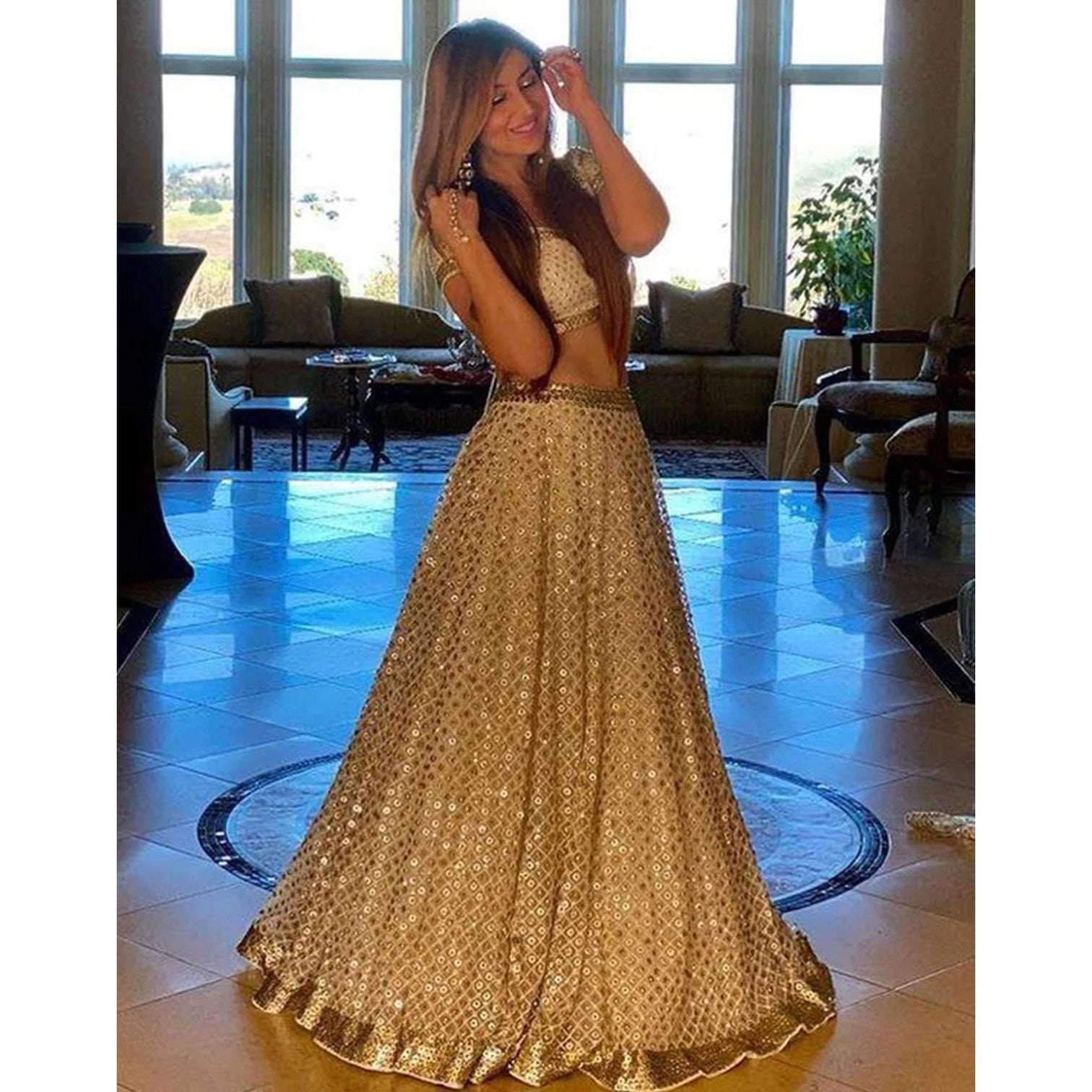 Gold Colored Net Lehenga Choli with Heavy Sequence Work
