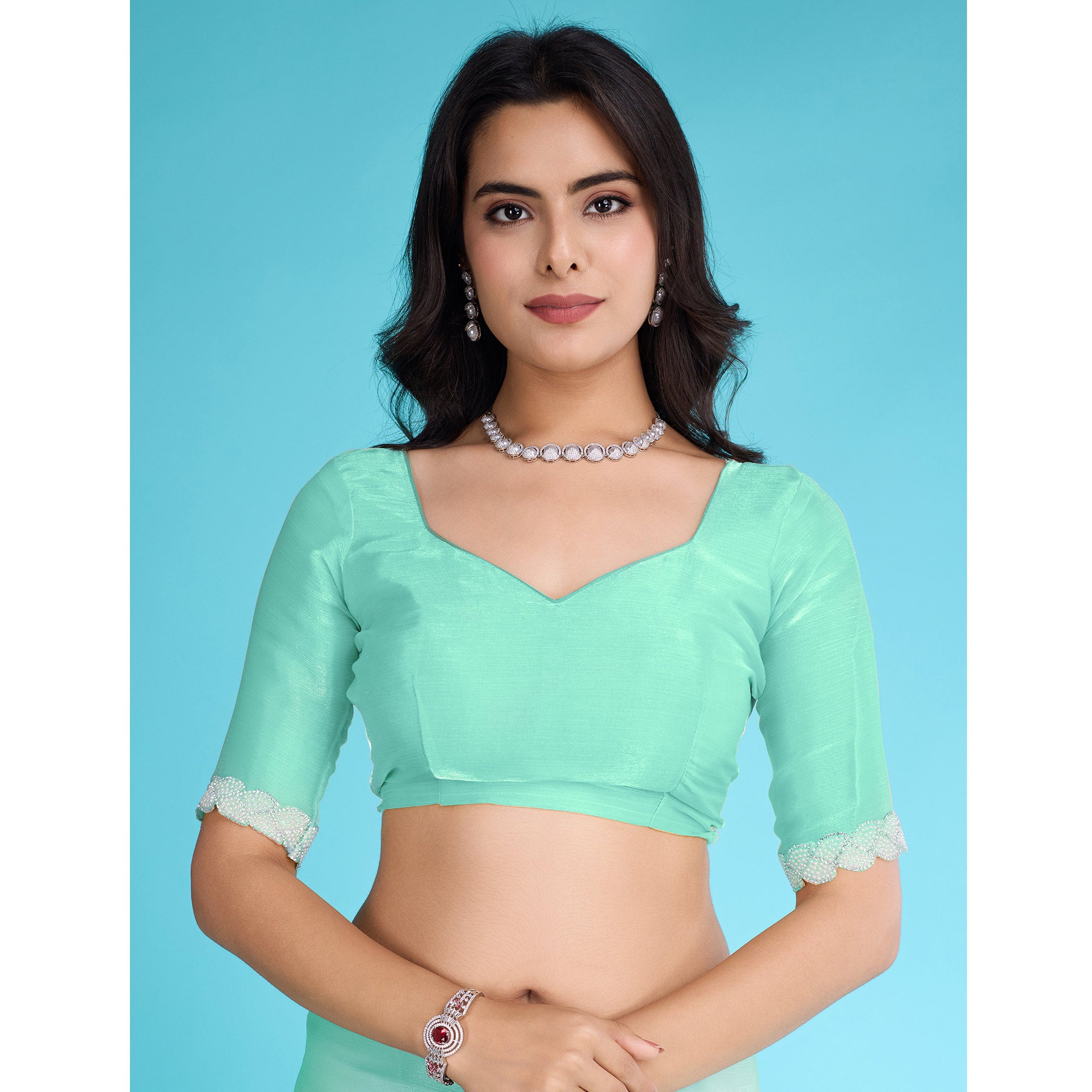 Turquoise Solid With Zarkan & Ceramic Pearl Diamond Lace Tissue Saree