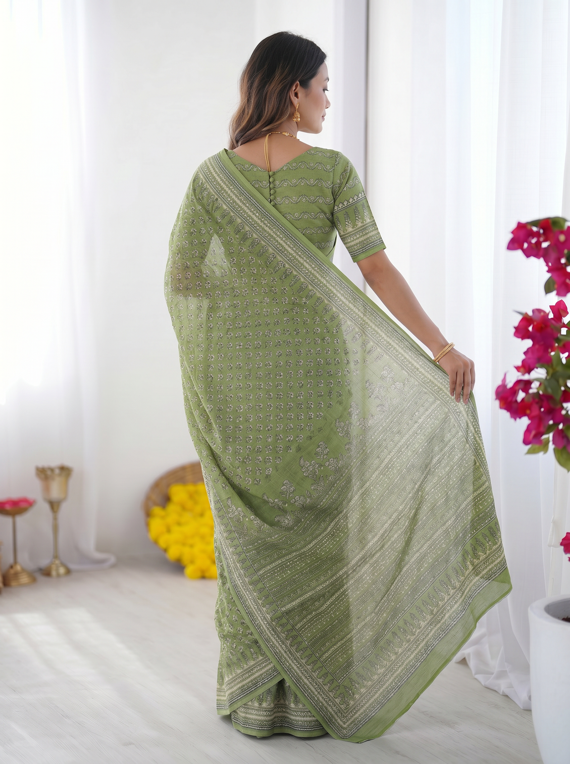 Sage green modal silk saree with delicate floral butti prints traditional heritage border elegant designer pallu