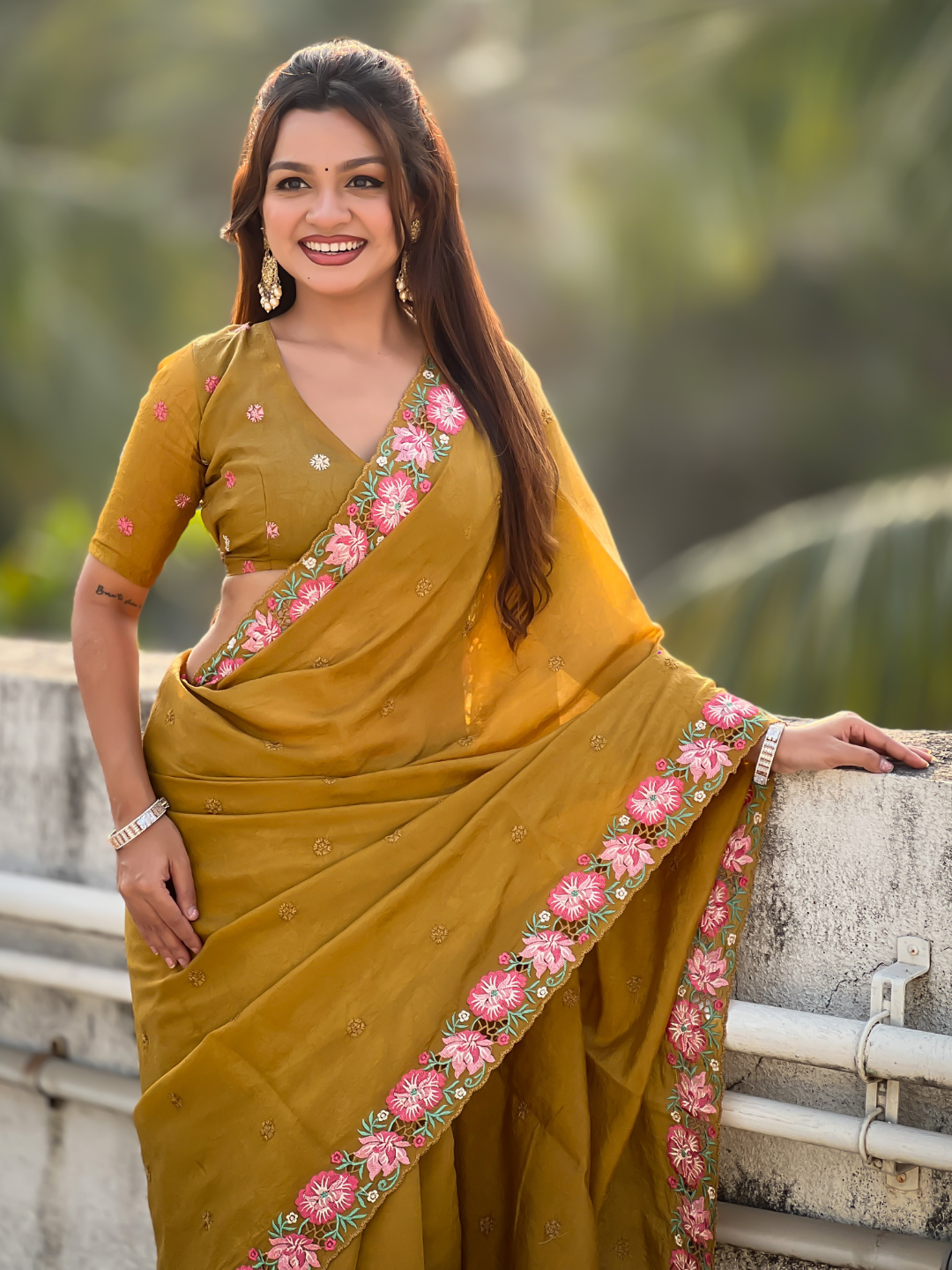 Mustard pure crush embroidered saree with multicolor floral motifs and cutwork border