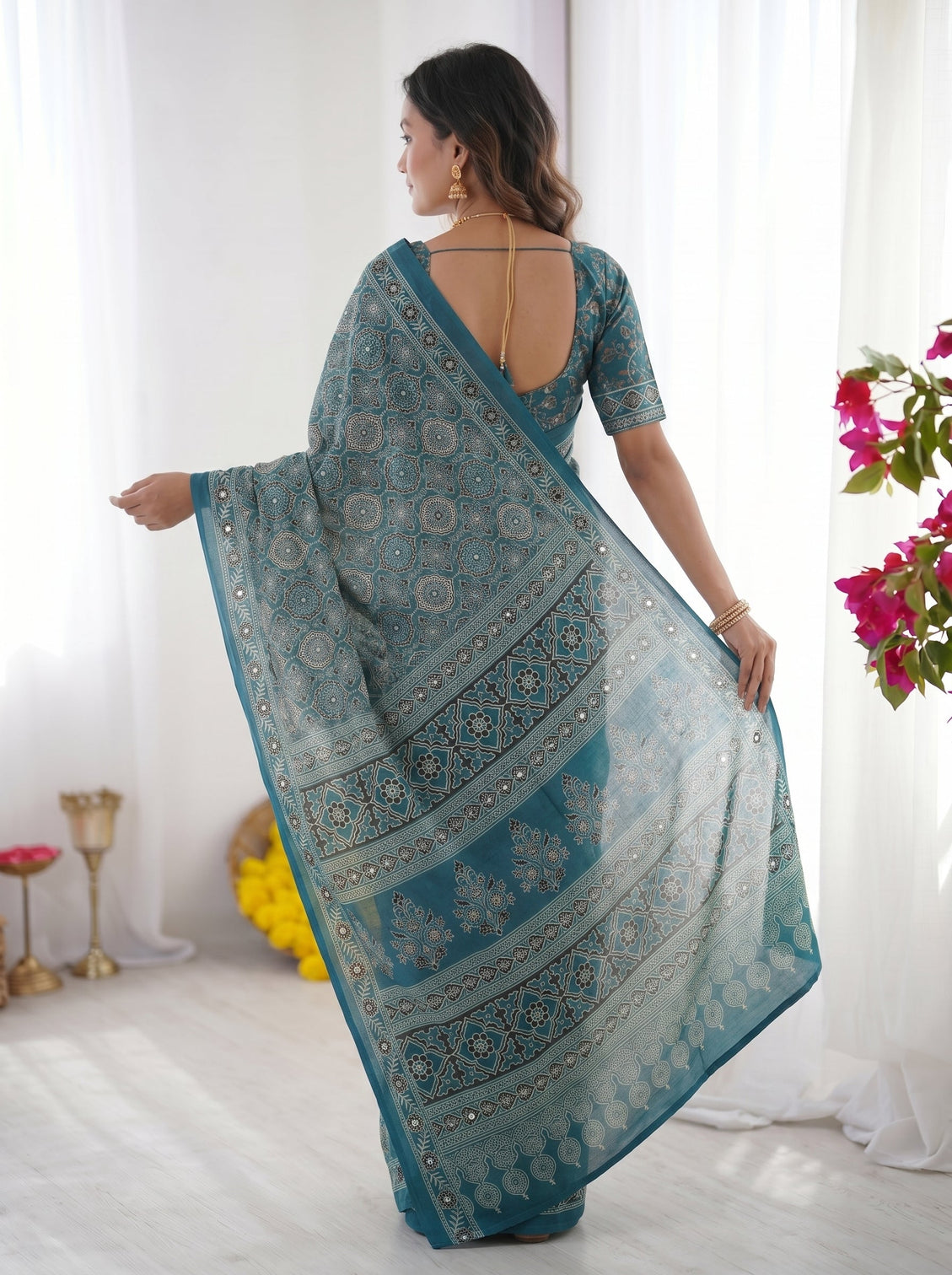 Teal blue modal silk saree with heritage geometric motifs intricate printed border traditional designer pallu