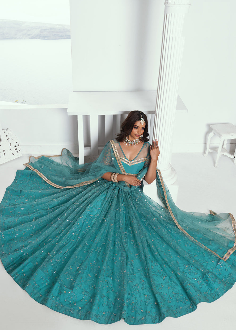 Gorgeous Rama Green Embroidered Net Wedding Lehenga Choli