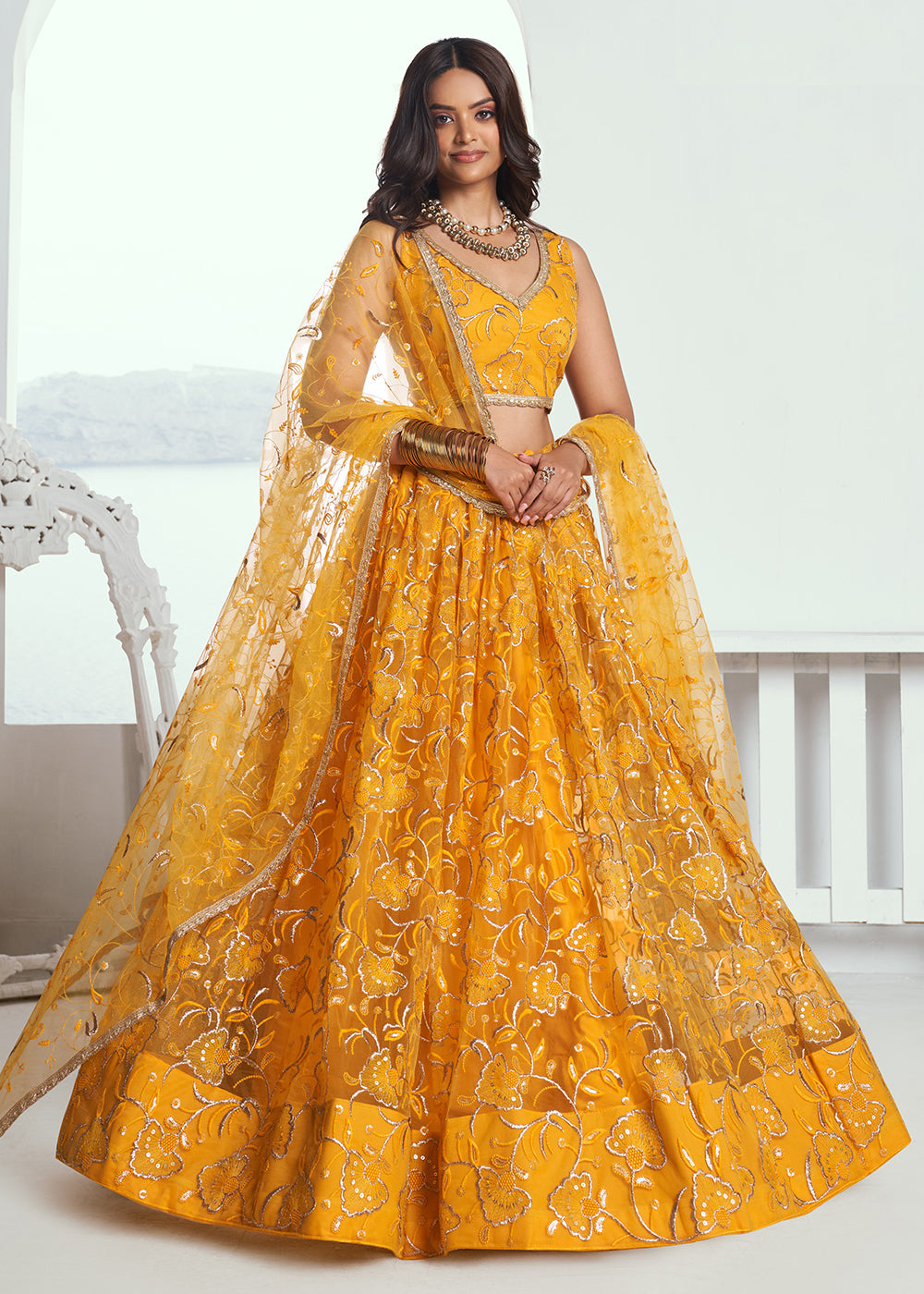 Exquisite Embroidered Net Yellow Wedding Wear Lehenga Choli