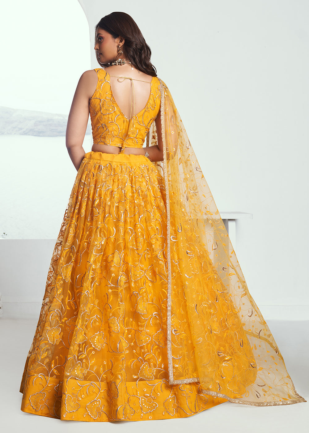 Exquisite Embroidered Net Yellow Wedding Wear Lehenga Choli