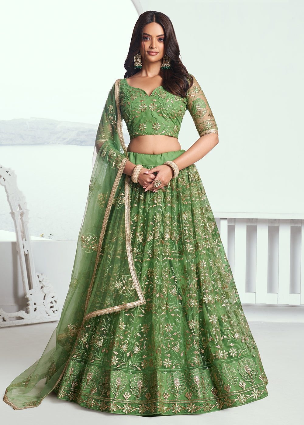 Superb Embroidered Net Pista Green Wedding Lehenga Choli