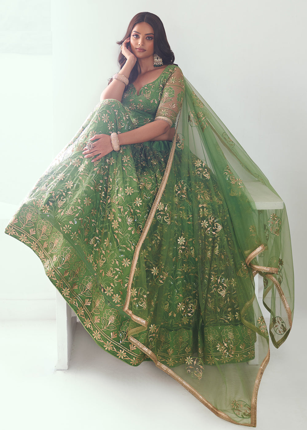 Superb Embroidered Net Pista Green Wedding Lehenga Choli