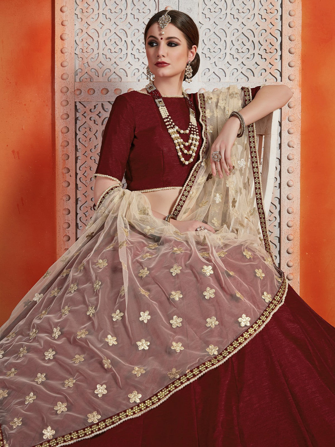Soft Net Maroon Semi Stitched Lehenga With Unstitched Blouse