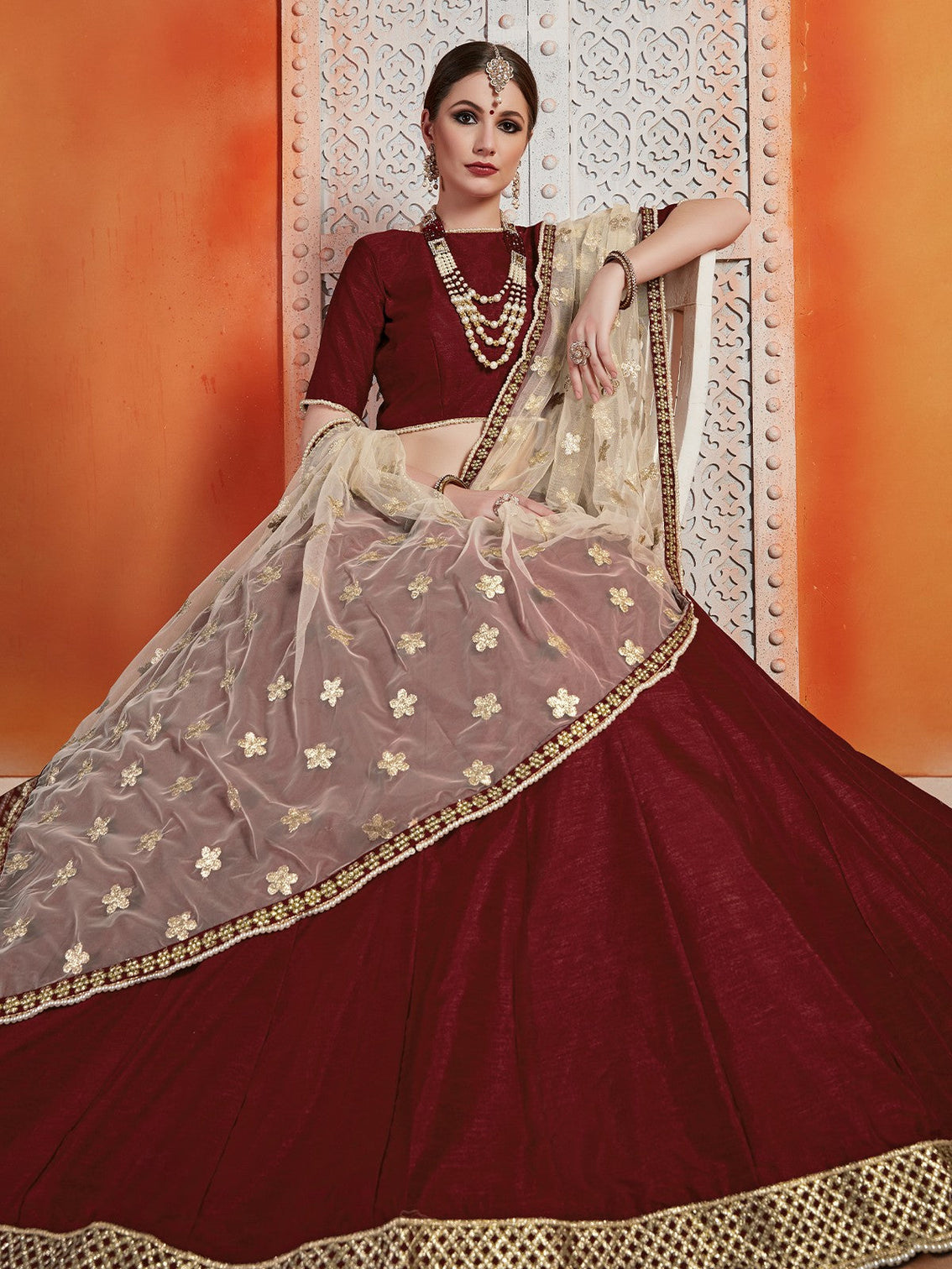 Soft Net Maroon Semi Stitched Lehenga With Unstitched Blouse
