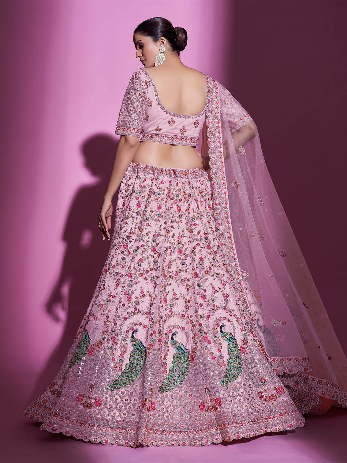 Peach Net Embroidered Semi Stitched Lehenga With Unstitched Blouse