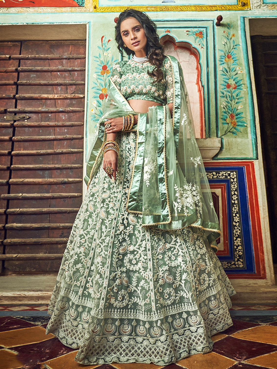 Sea Green Net Semi Stitched Lehenga With Unstitched Blouse