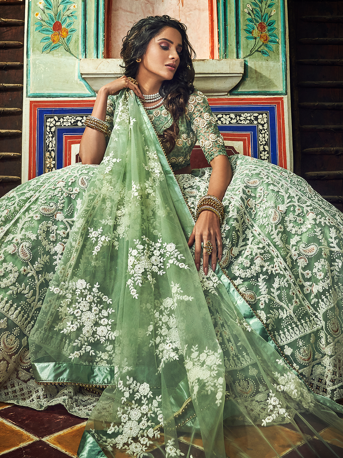 Sea Green Net Semi Stitched Lehenga With Unstitched Blouse