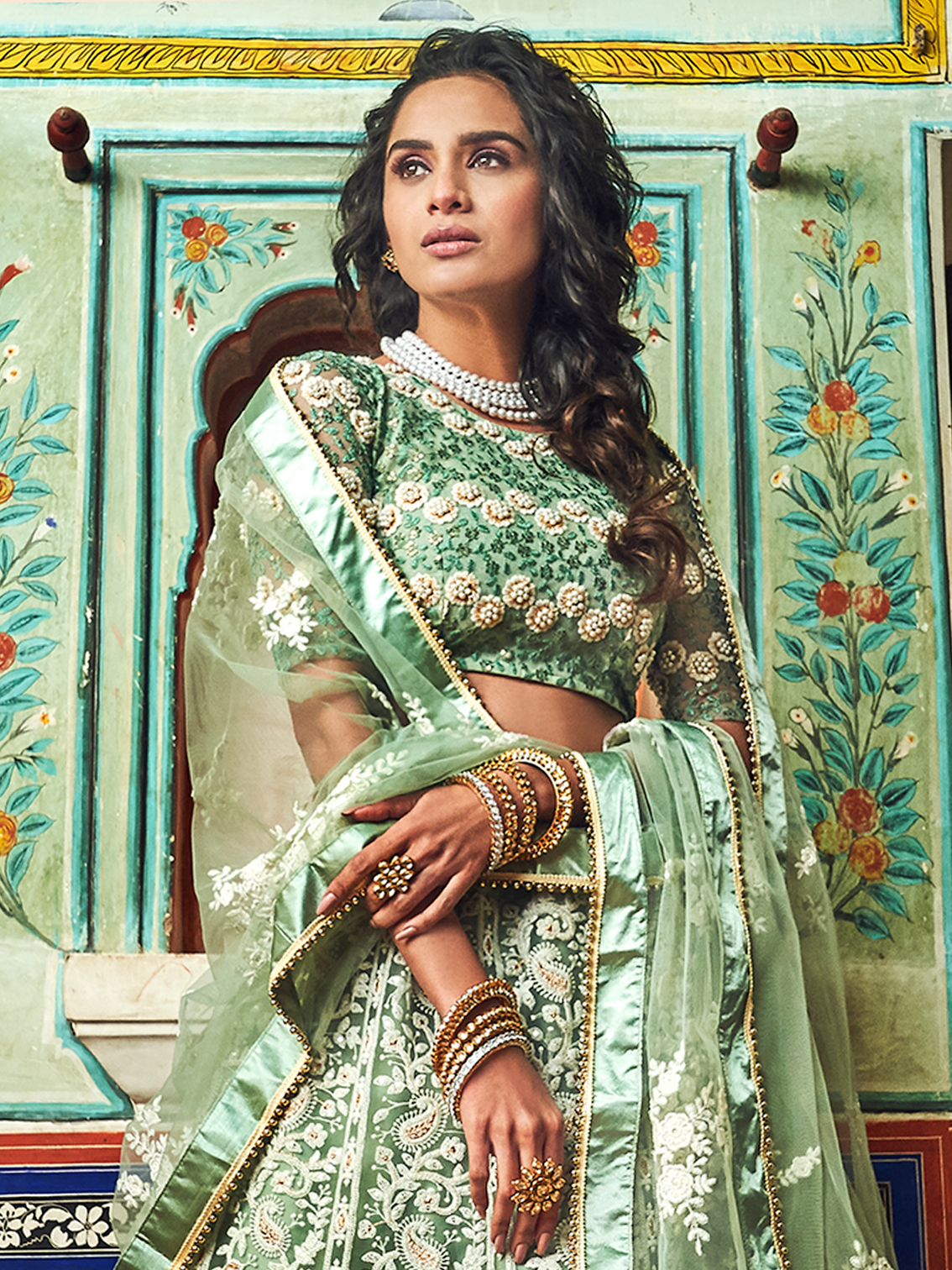 Sea Green Net Semi Stitched Lehenga With Unstitched Blouse