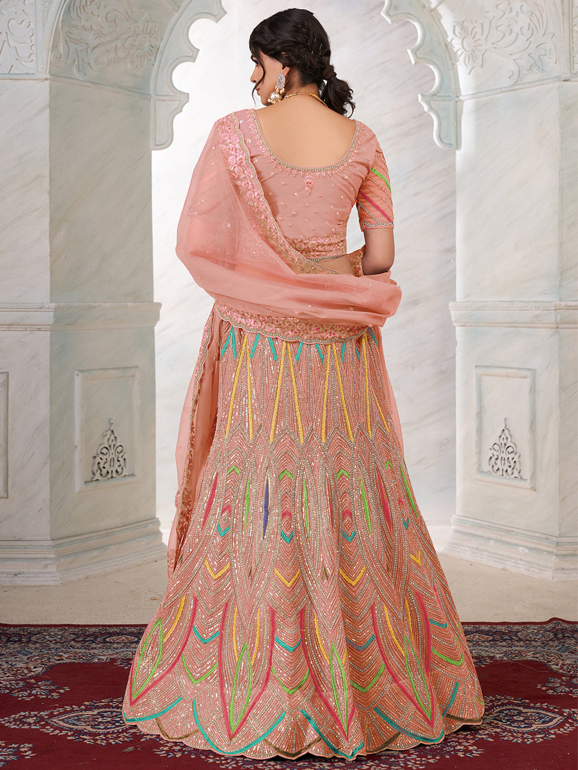 Peach Net Semi stitched Lehenga With Unstitched Blouse