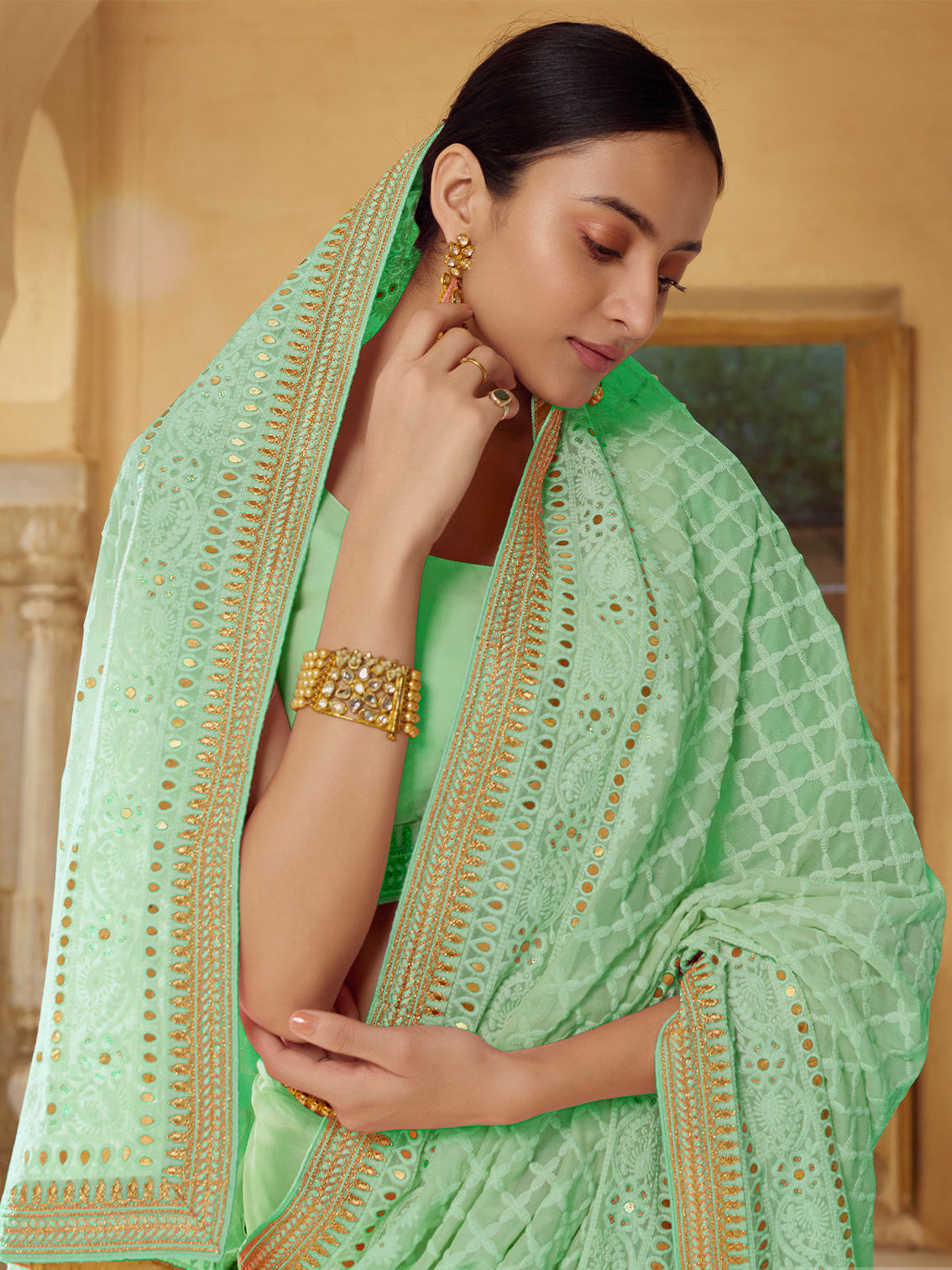 Sea Green Georgette Saree With Unstitched Blouse