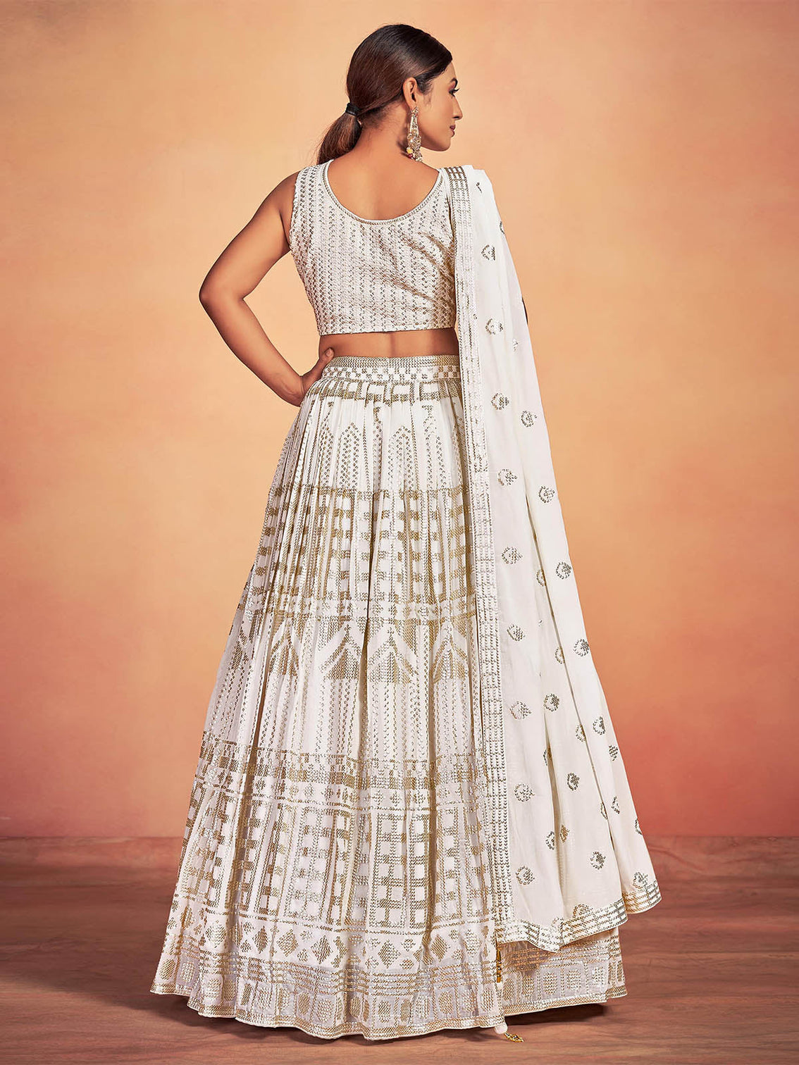 White Georgette Sequins Stitched Lehenga Choli