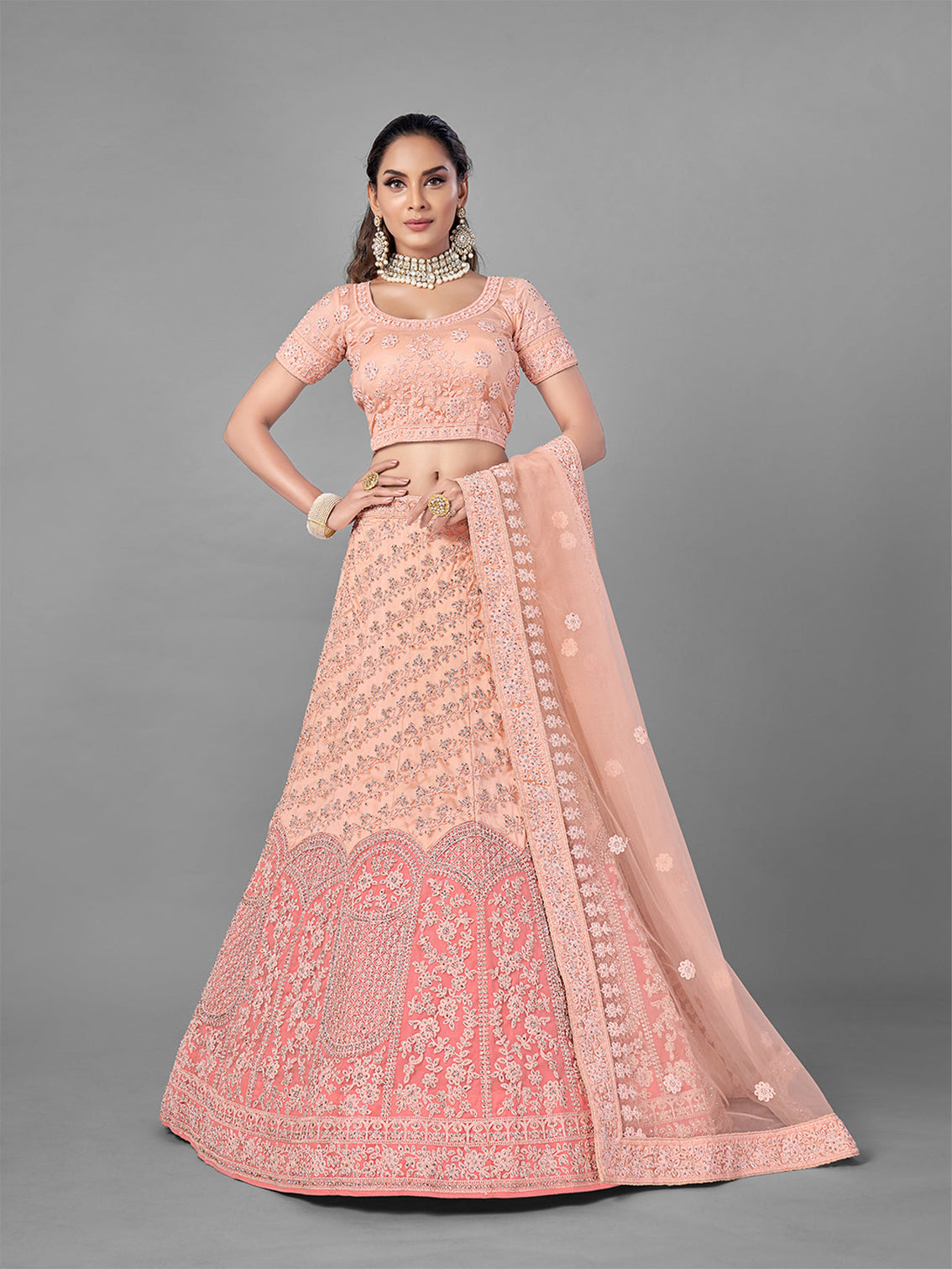 Peach Soft Net Semi Stitched Lehenga With Unstitched Blouse