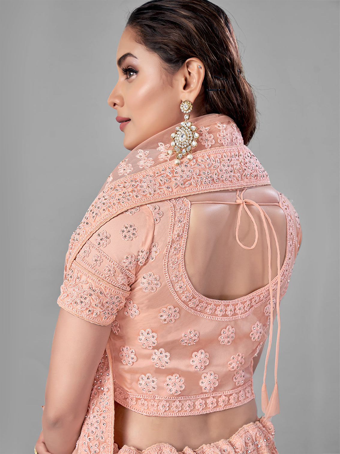 Peach Soft Net Semi Stitched Lehenga With Unstitched Blouse