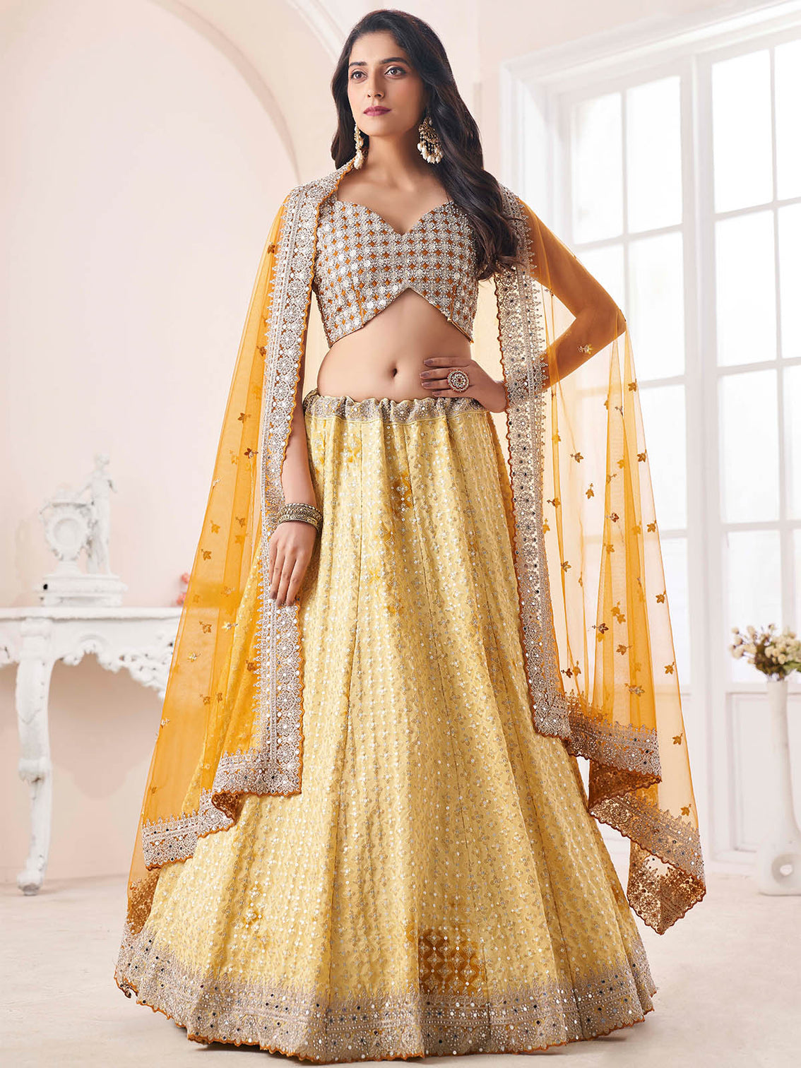 Yellow Georgette Embellished Semi Stitched Lehenga Choli