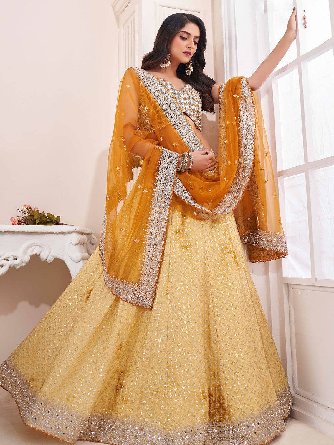 Yellow Georgette Embellished Semi Stitched Lehenga Choli
