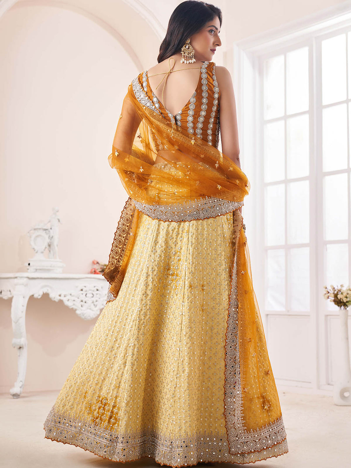 Yellow Georgette Embellished Semi Stitched Lehenga Choli