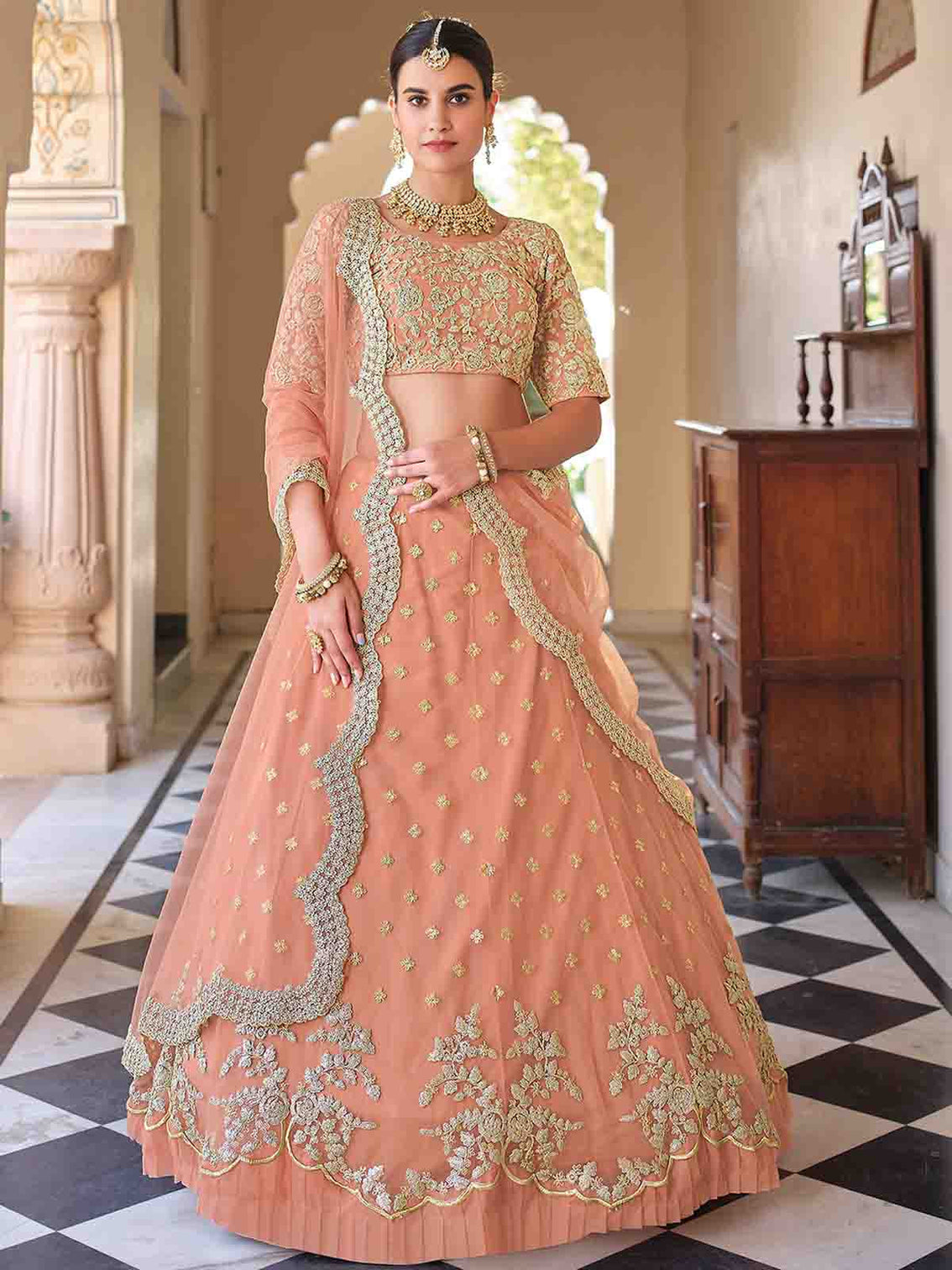 Pretty Peach Soft Net Semi Stitched Lehenga With Unstitched Blouse