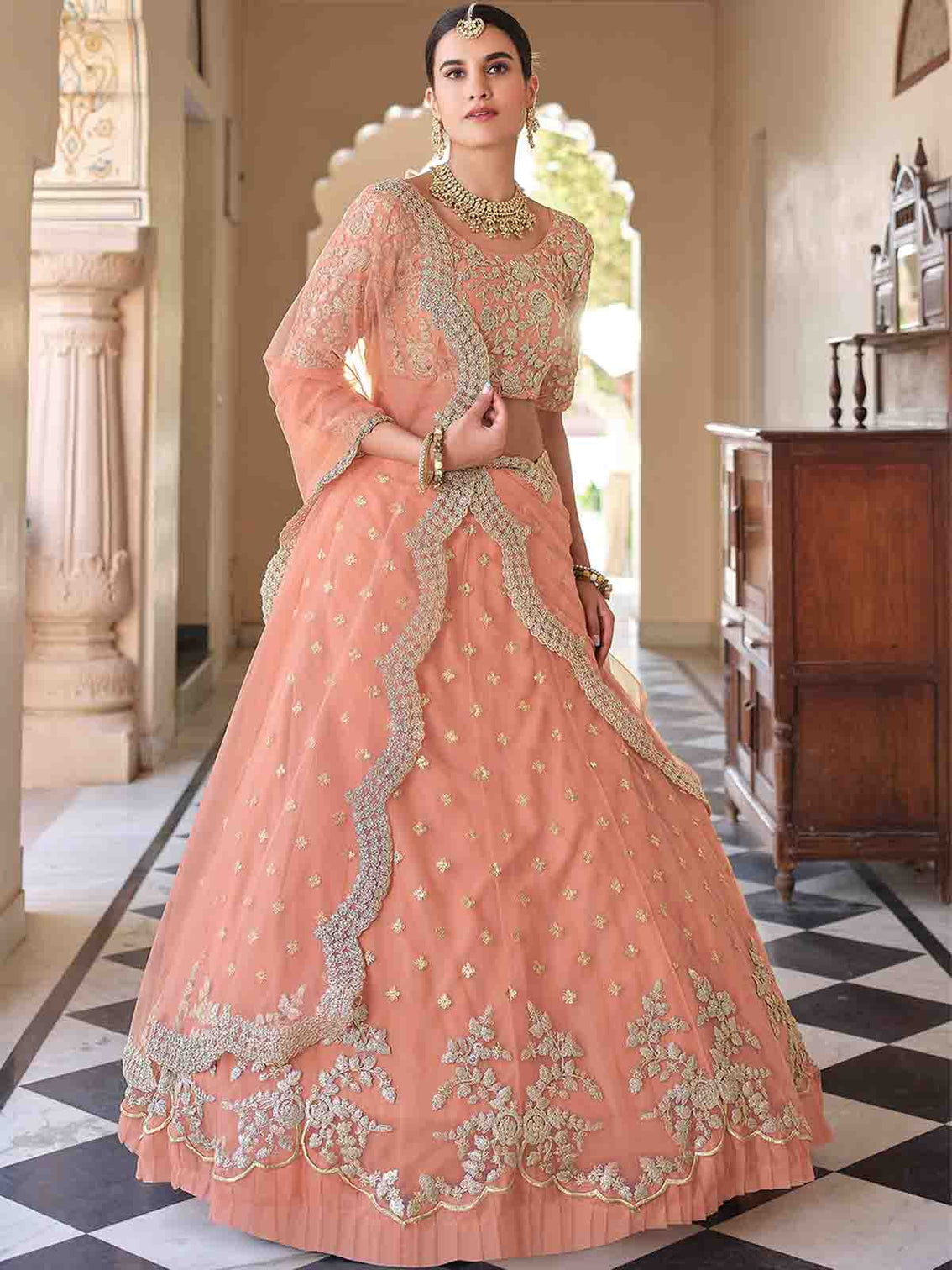Pretty Peach Soft Net Semi Stitched Lehenga With Unstitched Blouse