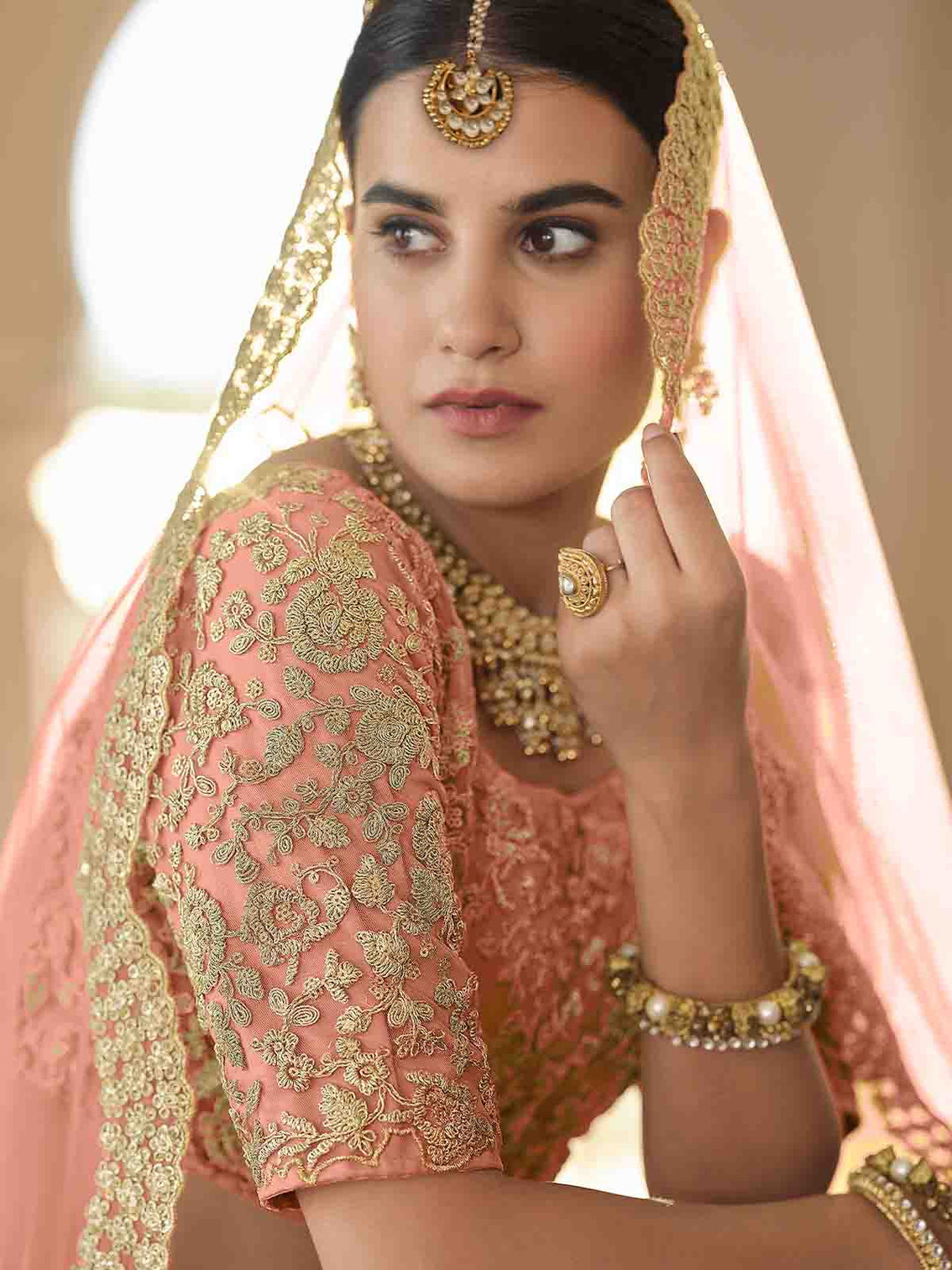 Pretty Peach Soft Net Semi Stitched Lehenga With Unstitched Blouse