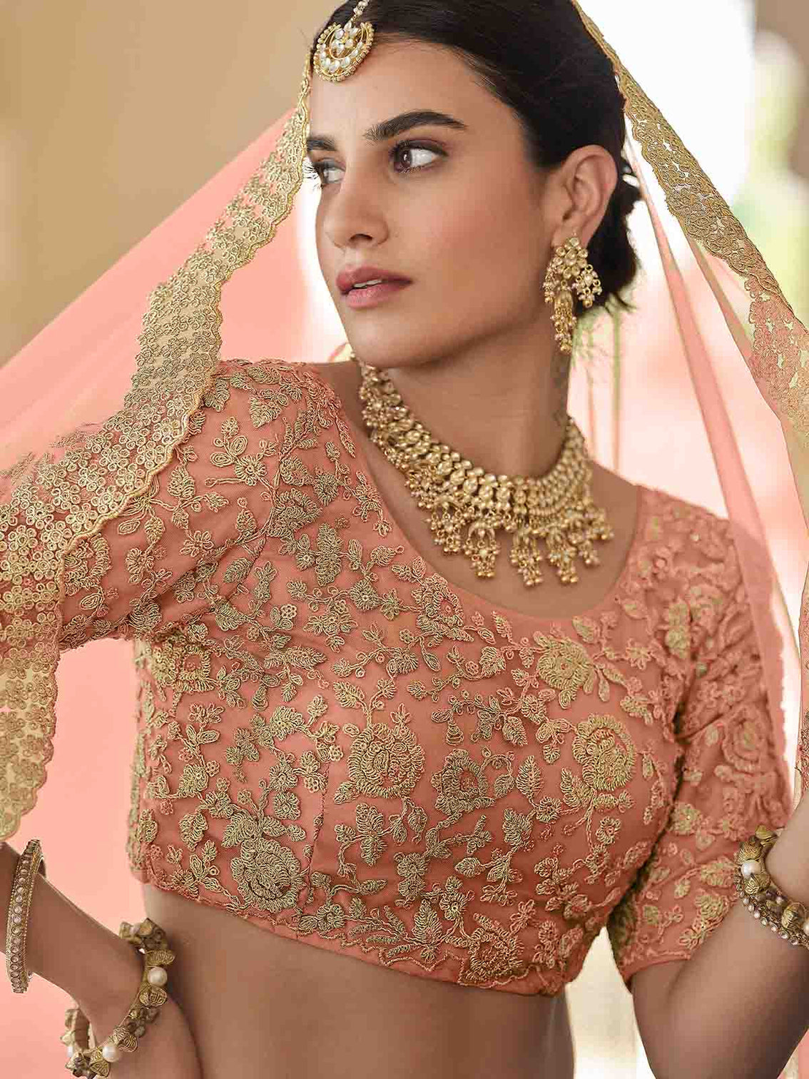 Pretty Peach Soft Net Semi Stitched Lehenga With Unstitched Blouse