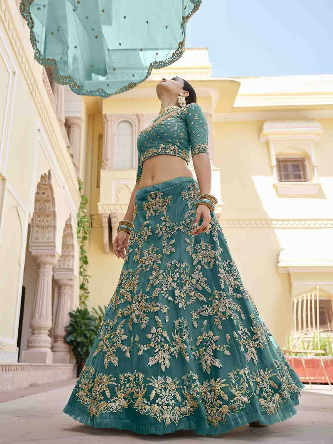 Impressive Teal Soft Net Semi Stitched Lehenga With Unstitched Blouse
