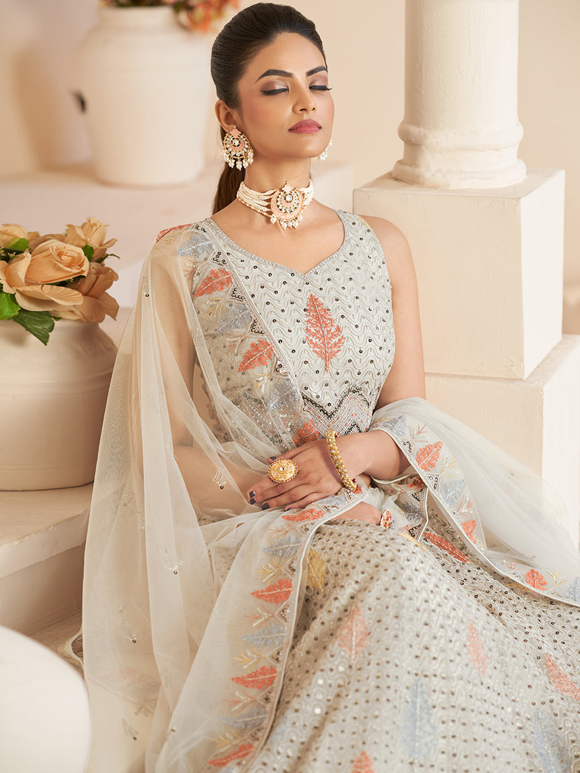 White Net Embroidered Semi stitched Lehenga With Unstitched blouse