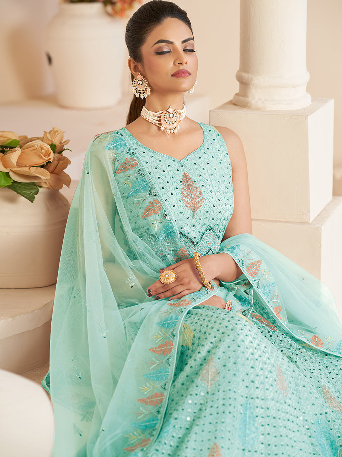Turquoise Net Embroidered Semi stitched Lehenga With Unstitched blouse