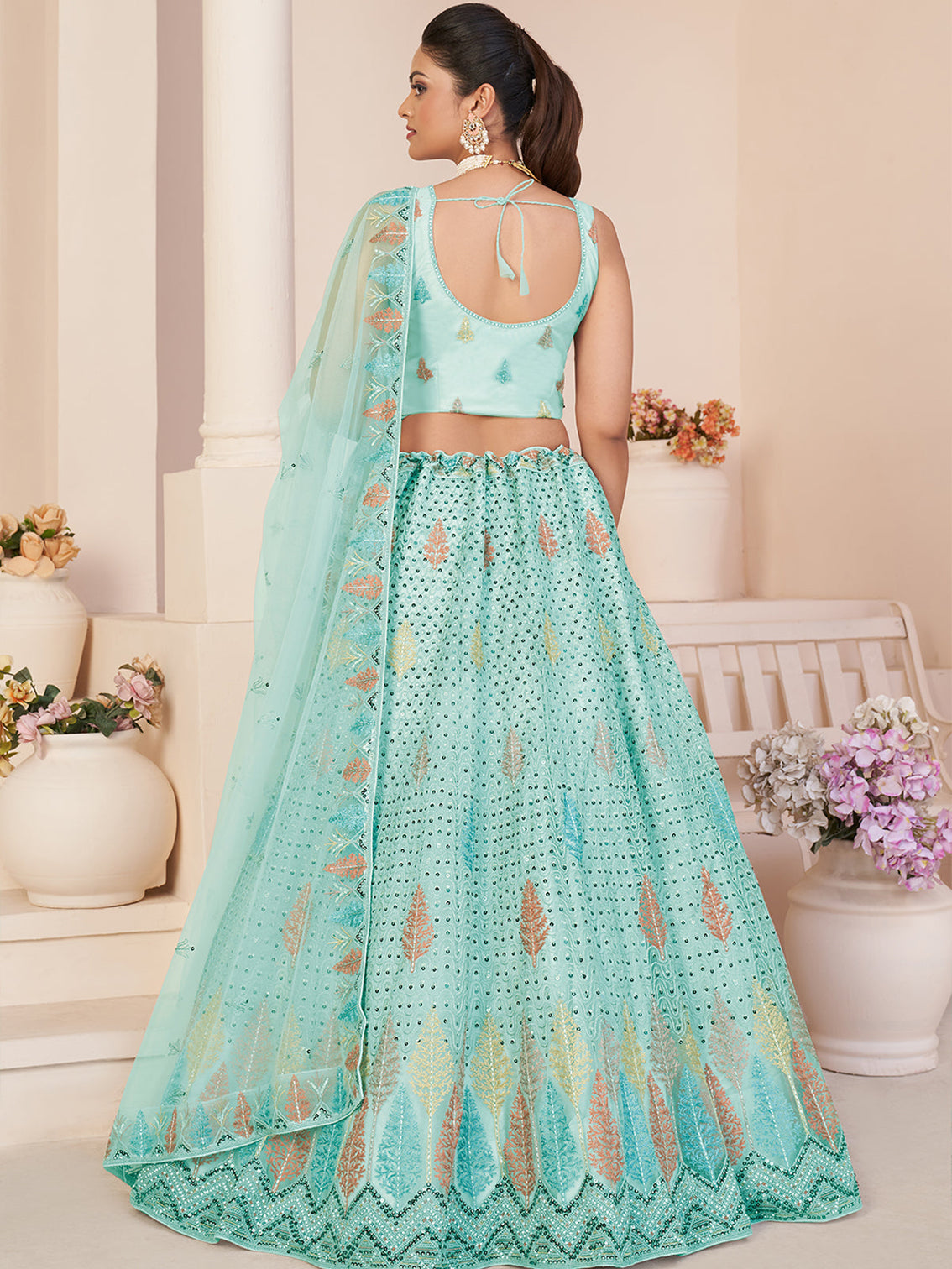 Turquoise Net Embroidered Semi stitched Lehenga With Unstitched blouse