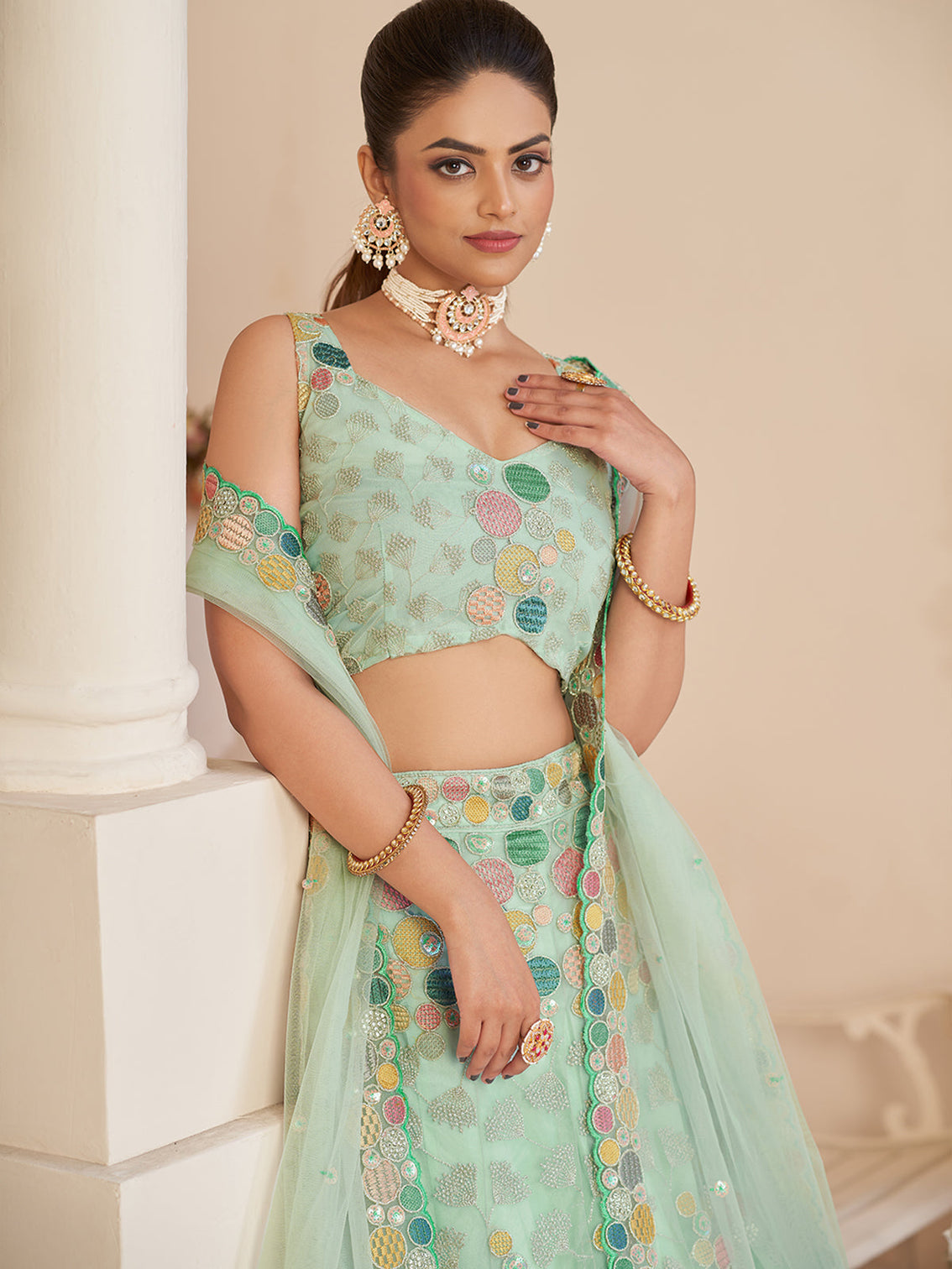 Turquoise Net Embroidered Semi stitched Lehenga With Unstitched blouse