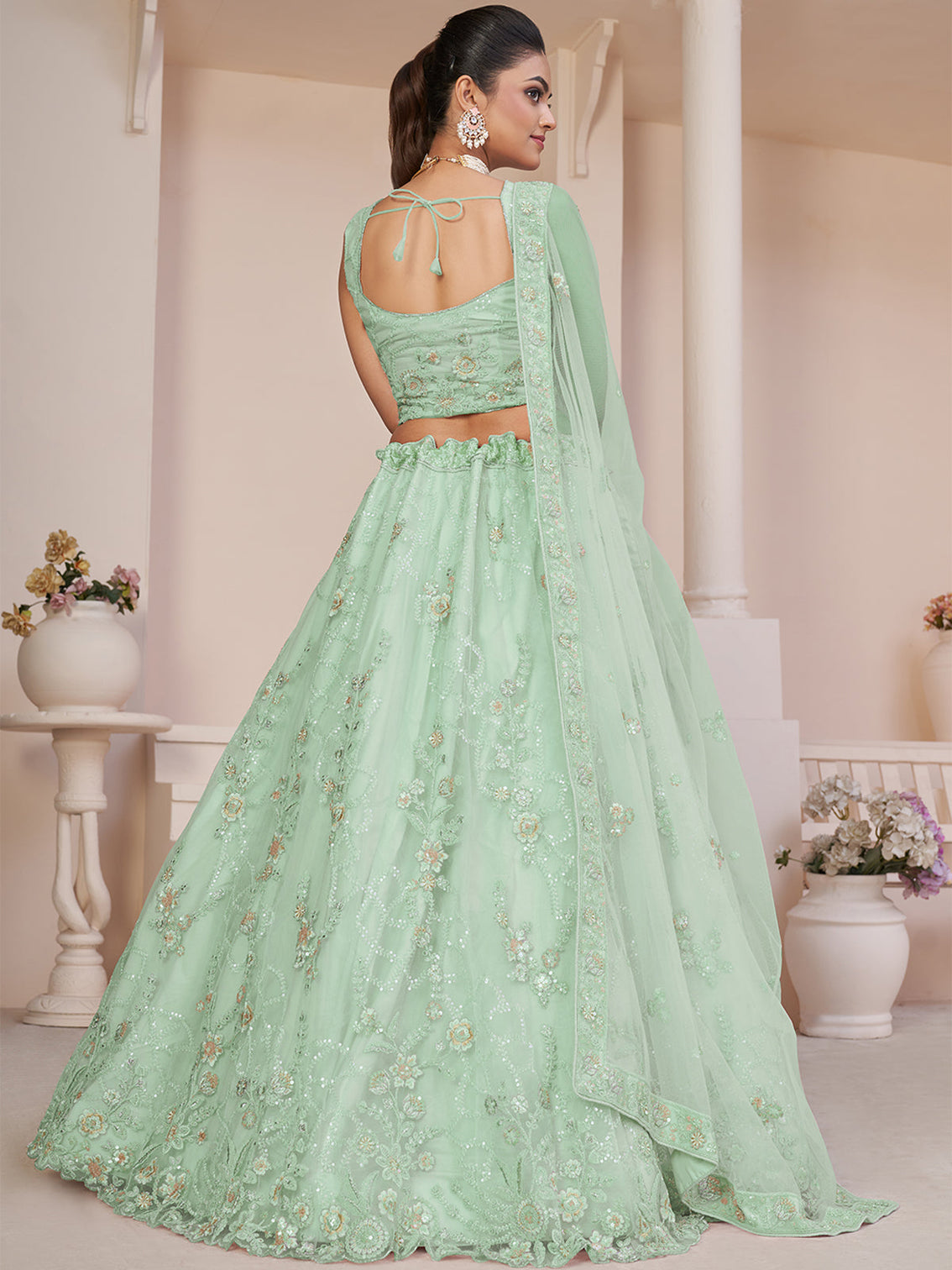 Turquoise Net Embroidered Semi stitched Lehenga With Unstitched blouse