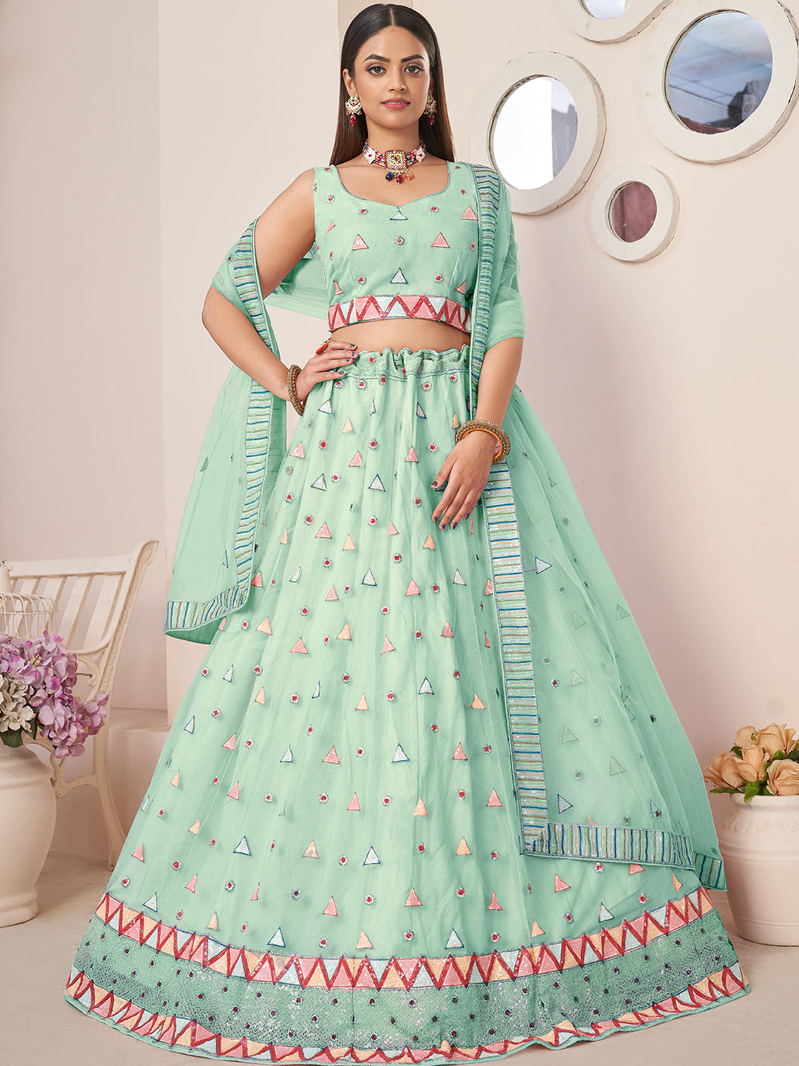 Turquoise Net Embellished Semi stitched Lehenga With Unstitched blouse