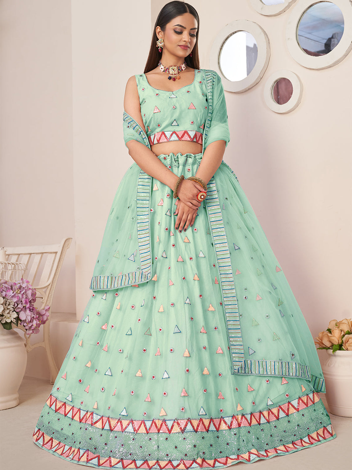 Turquoise Net Embellished Semi stitched Lehenga With Unstitched blouse