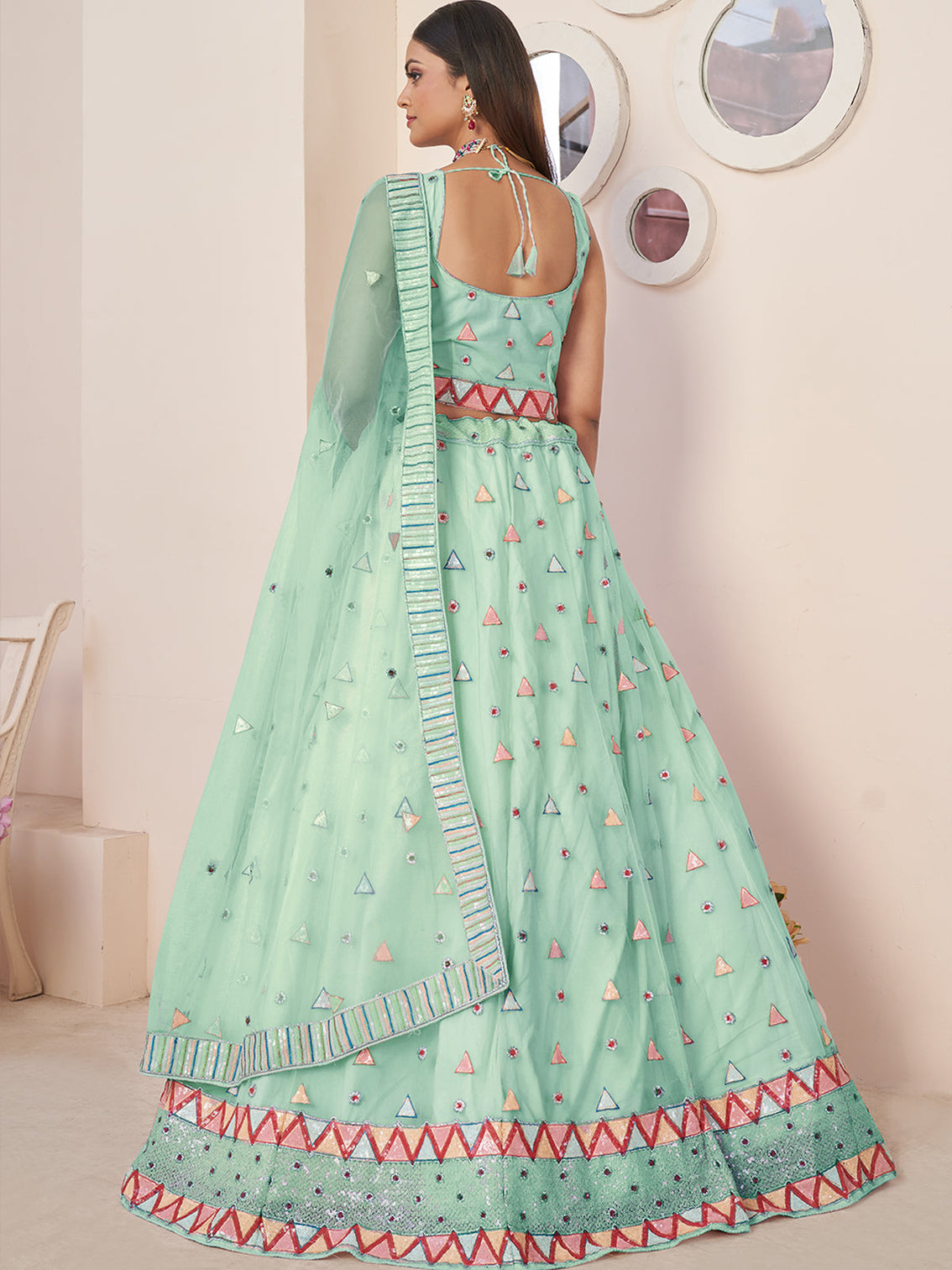 Turquoise Net Embellished Semi stitched Lehenga With Unstitched blouse