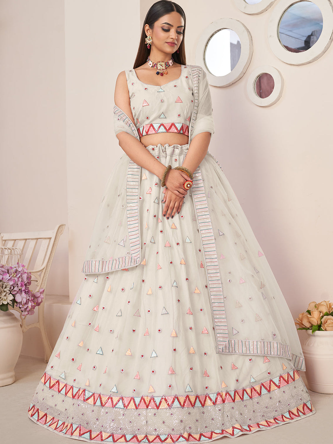 White Net Embellished Semi stitched Lehenga With Unstitched blouse