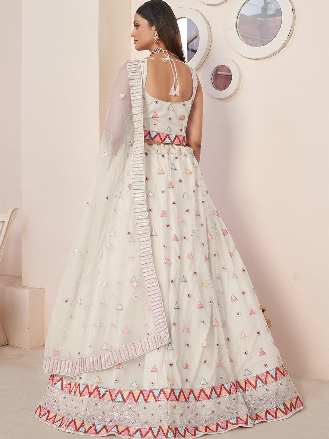 White Net Embellished Semi stitched Lehenga With Unstitched blouse