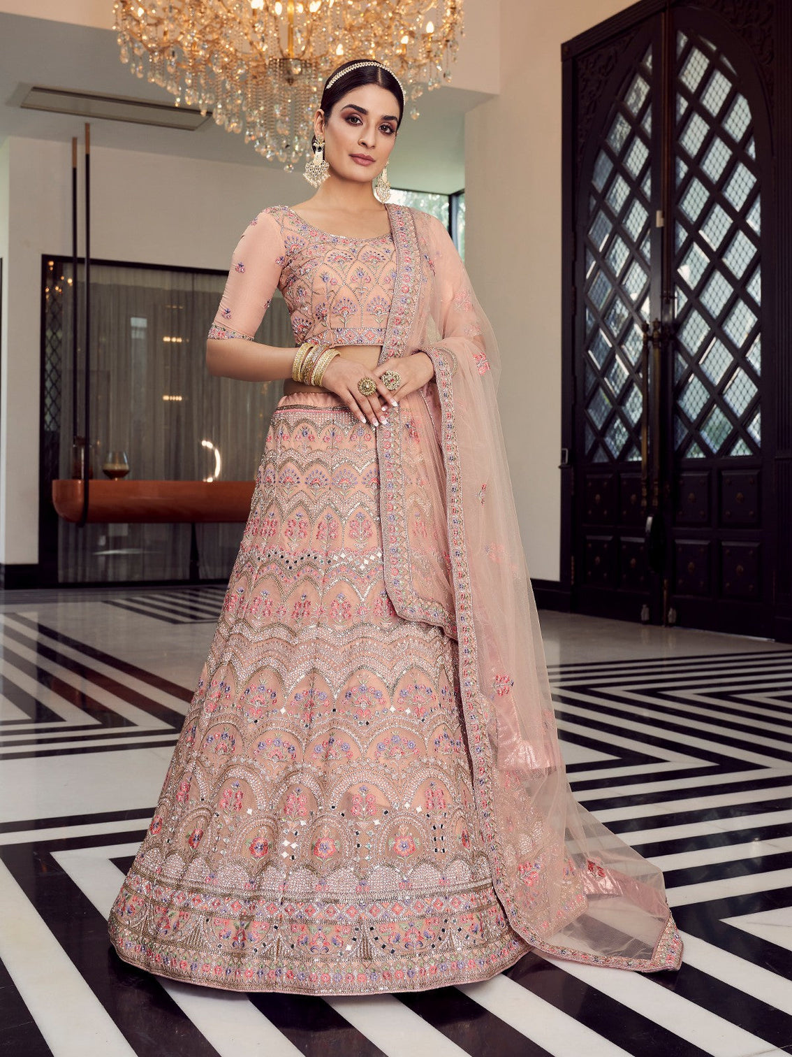 Peach Soft Net Semi Stitched Lehenga With Unstitched Blouse