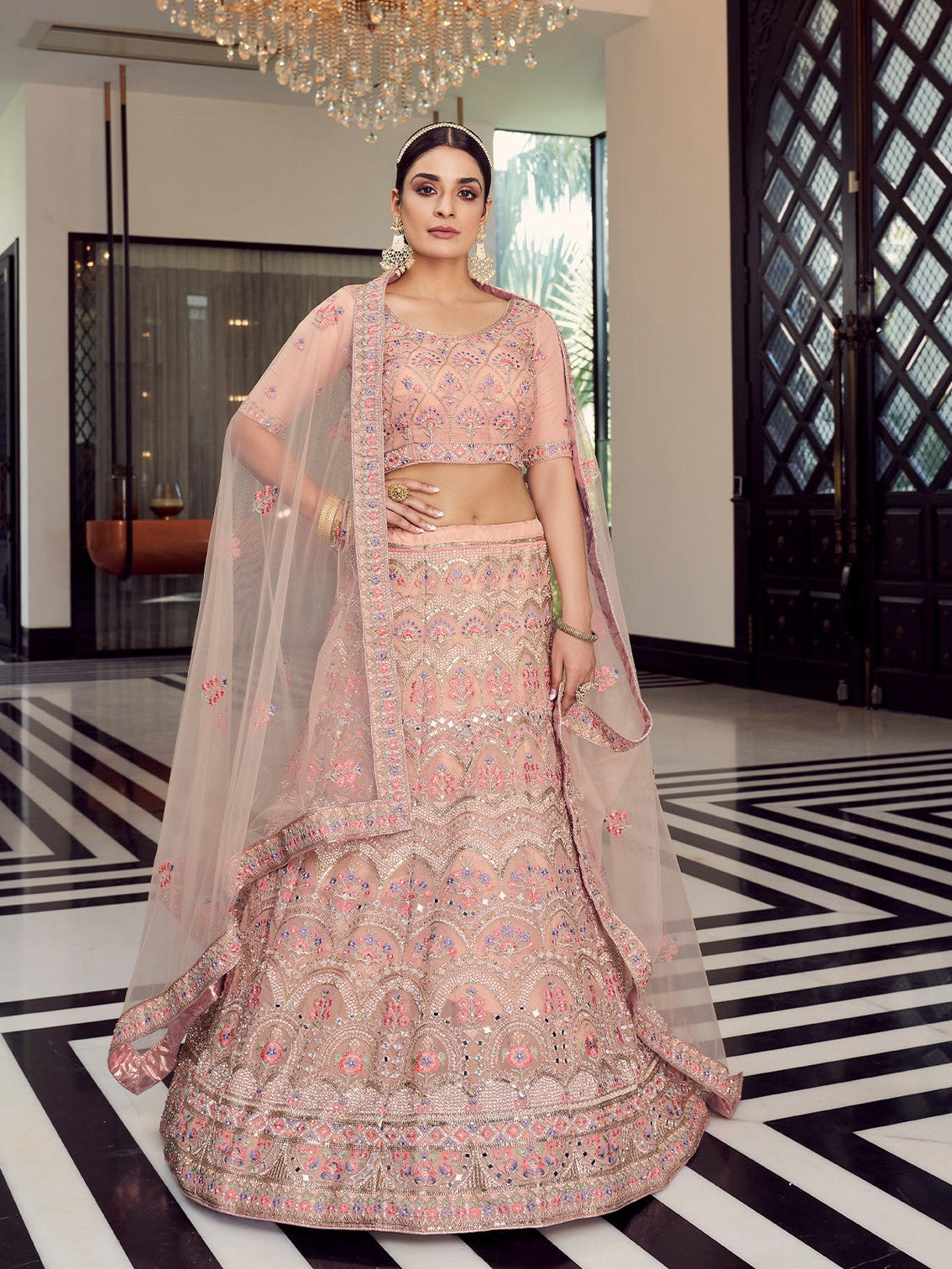 Peach Soft Net Semi Stitched Lehenga With Unstitched Blouse