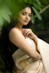 Luminous Beige Soft Silk Saree With Vestigial Blouse Piece